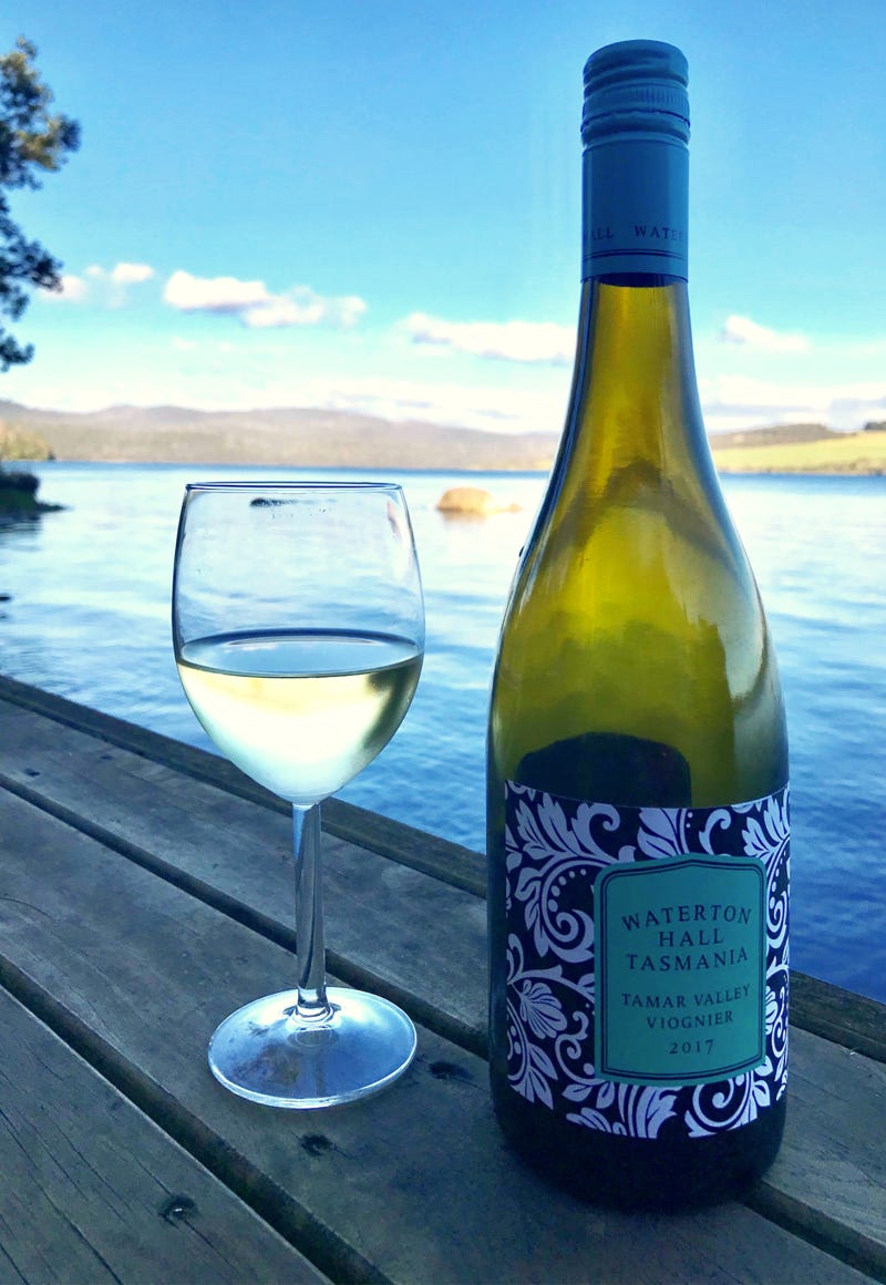 Waterton Hall Viognier bottle and glass overlooking the Tamar River